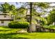 Charming home featuring a well-maintained lawn, mature trees, and attractive landscaping at 2247 Frisco Pl, Indianapolis, IN 46240