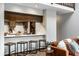 Eat-in kitchen features a peninsula with counter seating and seamless flow into the living space at 2247 Frisco Pl, Indianapolis, IN 46240