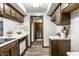 The kitchen provides ample cabinet and countertop space with an entrance to the hallway at 2247 Frisco Pl, Indianapolis, IN 46240