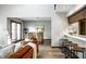 Open-concept living space with adjacent dining area and kitchen, providing seamless flow and connectivity at 2247 Frisco Pl, Indianapolis, IN 46240