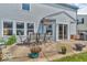A patio area with a table and chairs offers a relaxing place to sit outside at 2309 Westmere Dr, Plainfield, IN 46168