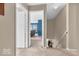 Hallway leading to living room, offering convenient access and transition at 2309 Westmere Dr, Plainfield, IN 46168