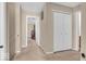 Hallway features neutral decor and closet space for storage at 2309 Westmere Dr, Plainfield, IN 46168