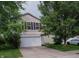 Charming two-story home featuring a two-car garage and well-maintained landscaping at 2355 Collins Way, Greenfield, IN 46140