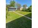 View of the backyard and outbuilding, perfect for storage or hobbies at 2543 Union St, Indianapolis, IN 46225