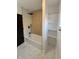 Modern bathroom featuring a stylish bathtub, shower with a black shower head, and built-in shelving at 2543 Union St, Indianapolis, IN 46225