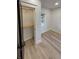 Open closet in a bedroom, featuring wooden shelving and a hanging rod at 2543 Union St, Indianapolis, IN 46225