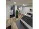 Modern bedroom featuring a comfortable bed, stylish decor, and an ensuite bathroom at 2543 Union St, Indianapolis, IN 46225