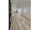 Spacious living room with luxury vinyl plank flooring and open access to the kitchen at 2543 Union St, Indianapolis, IN 46225