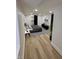 Finished basement bedroom with modern decor, wooden flooring, and closet at 2543 Union St, Indianapolis, IN 46225