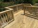 New wooden deck with railings, ready for entertaining and relaxing outdoors at 2875 N Dearborn St, Indianapolis, IN 46218