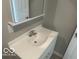 Bathroom featuring white vanity, countertop and a mirrored cabinet at 2879-81 N Dearborn St, Indianapolis, IN 46218
