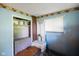 Blue bedroom features a dresser, built-in closet with shelving, and a sports-themed wallpaper border at 2911 N 200 W Rd, Franklin, IN 46131