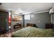 Cozy bedroom with fireplace, flat screen TV, and soft lighting showcasing a relaxing ambiance at 2911 N 200 W Rd, Franklin, IN 46131