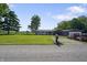 Ranch style home with a large front yard, detached garage and vintage truck at 2911 N 200 W Rd, Franklin, IN 46131