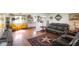 View of the open concept living room and kitchen with hardwood floors at 2911 N 200 W Rd, Franklin, IN 46131
