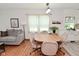 Comfortable dining area with bright windows, seamlessly connected to the living space and kitchen at 3059 Tansel Rd, Indianapolis, IN 46234