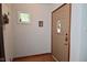 Inviting entryway with natural light, wood floors, and convenient access to the rest of the home at 3059 Tansel Rd, Indianapolis, IN 46234