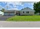 This home has an attached two car garage with a well maintained lawn and paved driveway at 3059 Tansel Rd, Indianapolis, IN 46234