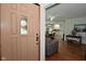Charming front door view into living spaces featuring hardwood floors and an open-concept design at 3059 Tansel Rd, Indianapolis, IN 46234