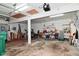 Open and spacious garage area with overhead lighting, perfect for parking and storage, or as a workshop space at 3059 Tansel Rd, Indianapolis, IN 46234