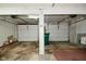 Spacious two car garage with two overhead door openers and ample room for parking and storage at 3059 Tansel Rd, Indianapolis, IN 46234