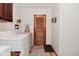 Functional laundry room with washer, dryer, and cabinet space for storage at 3059 Tansel Rd, Indianapolis, IN 46234