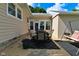 Inviting patio featuring an outdoor dining set and swing, ideal for relaxation and entertainment at 3059 Tansel Rd, Indianapolis, IN 46234