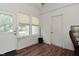 Bright sunroom with tile floors and multiple windows for natural light at 3059 Tansel Rd, Indianapolis, IN 46234