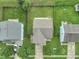 Aerial view showcasing a well-maintained home with lush backyard and neatly landscaped surroundings in a suburban setting at 3075 W Crosscreek Dr, Monrovia, IN 46157