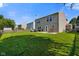 Spacious backyard showcasing a grassy area, patio, and fenced perimeter for privacy and outdoor enjoyment at 3075 W Crosscreek Dr, Monrovia, IN 46157