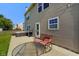 Cozy backyard patio with grill and patio furniture seating, perfect for outdoor dining and entertaining at 3075 W Crosscreek Dr, Monrovia, IN 46157