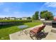 Backyard featuring an outdoor seating area on the patio and a green lawn, surrounded by a wooden fence at 3075 W Crosscreek Dr, Monrovia, IN 46157