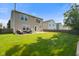 Expansive backyard with lush lawn, inviting patio, and privacy fence, ideal for Gathering gatherings and relaxation at 3075 W Crosscreek Dr, Monrovia, IN 46157
