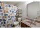 Bathroom featuring a vanity with a decorative sink, a mirror, and a shower-tub combination at 3075 W Crosscreek Dr, Monrovia, IN 46157