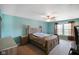 Serene bedroom with a cozy atmosphere, a ceiling fan, and natural light streaming in through the window at 3075 W Crosscreek Dr, Monrovia, IN 46157