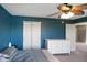 Bedroom featuring a ceiling fan, a closet with bi-fold doors, and natural light at 3075 W Crosscreek Dr, Monrovia, IN 46157