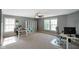 Spacious bonus room featuring multiple workstations and large windows providing natural light at 3075 W Crosscreek Dr, Monrovia, IN 46157