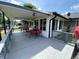 Inviting back deck with outdoor seating, a covered area, and serene views at 31 S Sugar Creek Dr, New Palestine, IN 46163
