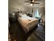 Bedroom showcasing a bed, ceiling fan, and bedside tables at 3301 S Lockburn St, Indianapolis, IN 46221