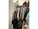 This closet features shelving and racks packed with storage containers, clothes, and a variety of other items at 3301 S Lockburn St, Indianapolis, IN 46221