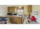 Efficient kitchen setup with a sink, appliances, and natural light from the window at 3304 Coffey St, Indianapolis, IN 46217