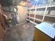 Unfinished basement featuring water heater and wooden shelving at 3975 Keyway Dr, Greenwood, IN 46143