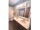 Bathroom with dual sink vanity, nautical wallpaper, and shower at 3975 Keyway Dr, Greenwood, IN 46143