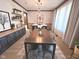 Formal dining room featuring a dining table, chairs, and decor shelving at 3975 Keyway Dr, Greenwood, IN 46143