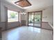 Light-filled dining room with slider door and large window at 3975 Keyway Dr, Greenwood, IN 46143