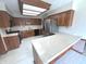 Charming kitchen featuring wood cabinets, modern appliances, and a bright, spacious atmosphere at 3975 Keyway Dr, Greenwood, IN 46143