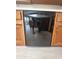 This kitchen includes a built-in black Maytag dishwasher and wooden cabinets at 3975 Keyway Dr, Greenwood, IN 46143