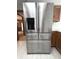 A stainless steel KitchenAid refrigerator compliments the wood cabinetry in this kitchen at 3975 Keyway Dr, Greenwood, IN 46143