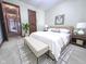 Comfortable bedroom featuring a large bed, bench, and coordinating decor at 3975 Keyway Dr, Greenwood, IN 46143